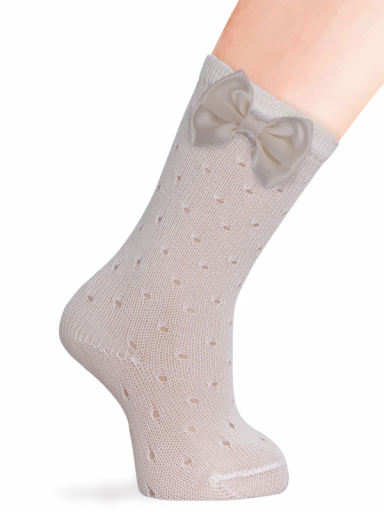 Calcetines altos perle calado plumeti con lazo de raso doble Marfil Ivory