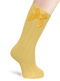 Calcetines altos canalé con lazo de raso con volumen Mostaza Mustard