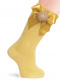 Calcetines altos lisos con lazo de raso y pompón Mostaza Mustard