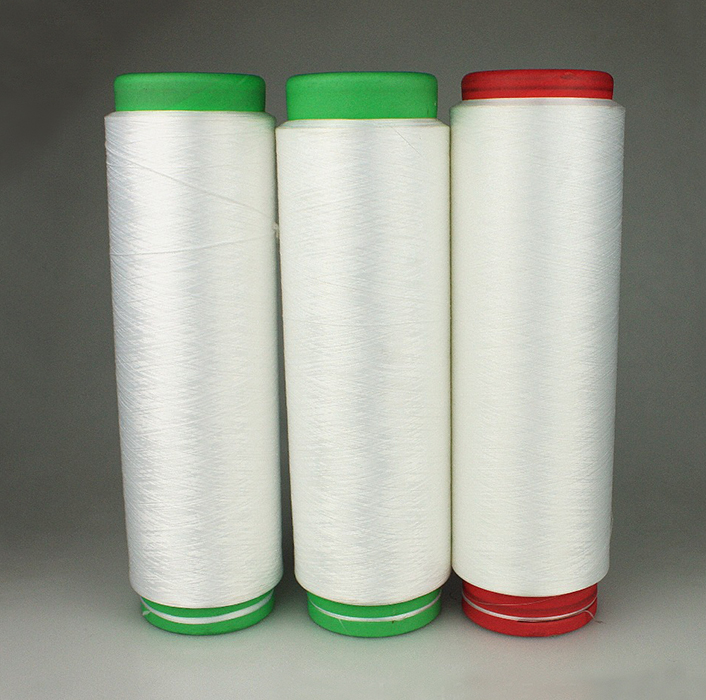 Hilo bicomponente Hilo bicomponente formado por dos polímeros unidos mediante el calor